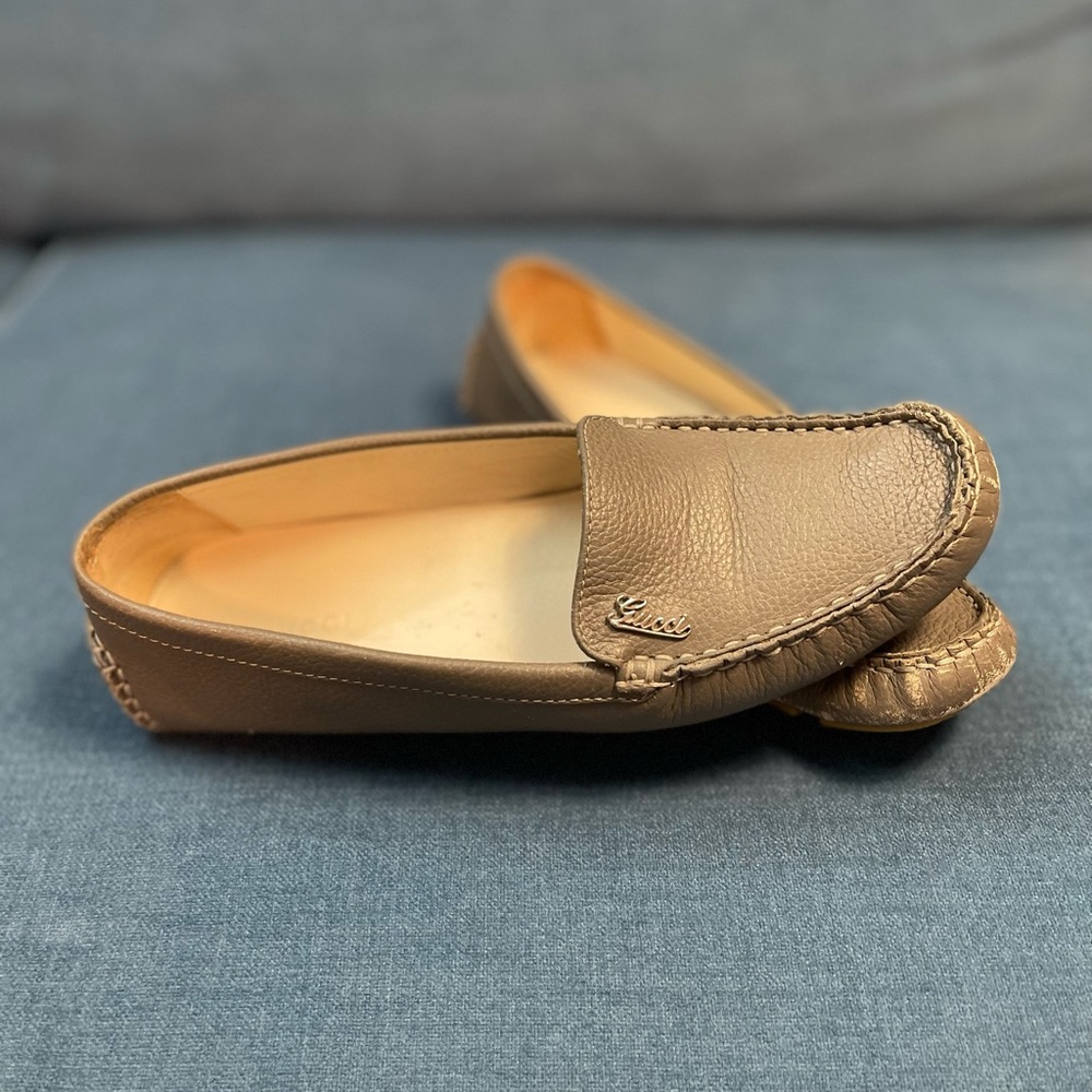 Gray Gucci driving loafers
